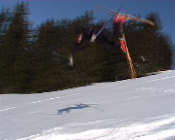Trying the front flip, but eating the snow. It hurts................