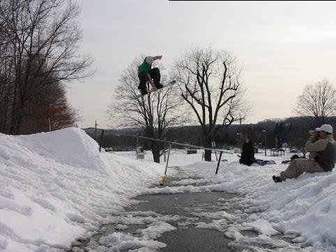 sick rail even with a snowboarder