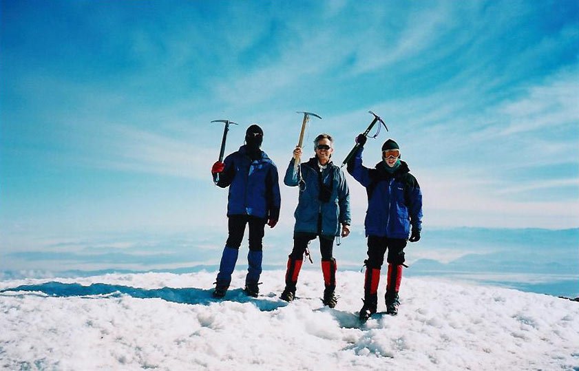 standing at 14,411 feet ( Mt Rainier summit )