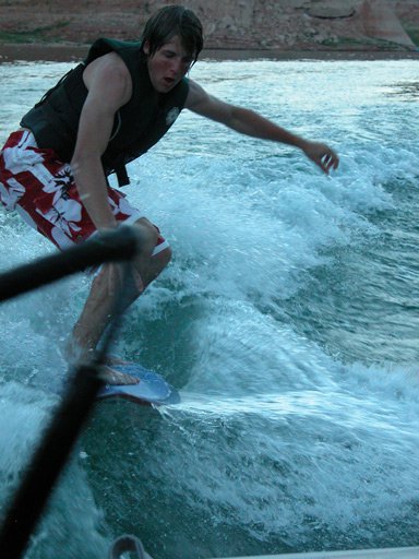 Throwing Handle in Boat while Wakesurfing