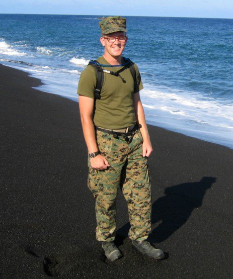 Me, on invasion beach Iwo Jima, note the extremely black sand, it was cool.