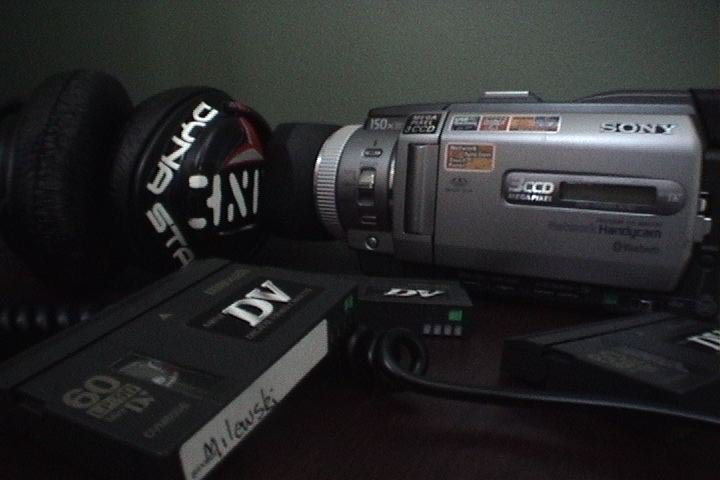 one of my cameras, headphones, and DVmini tapes I though it looked kinda cool