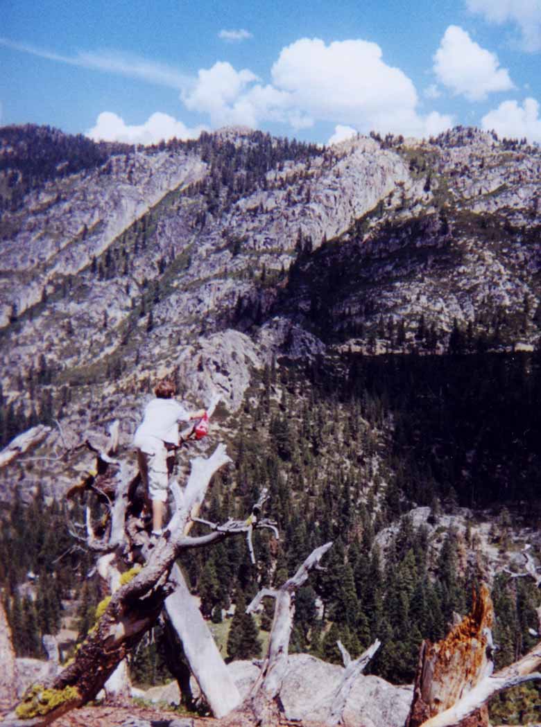 David Hangs the dangle out over the cliff, claiming the rock.