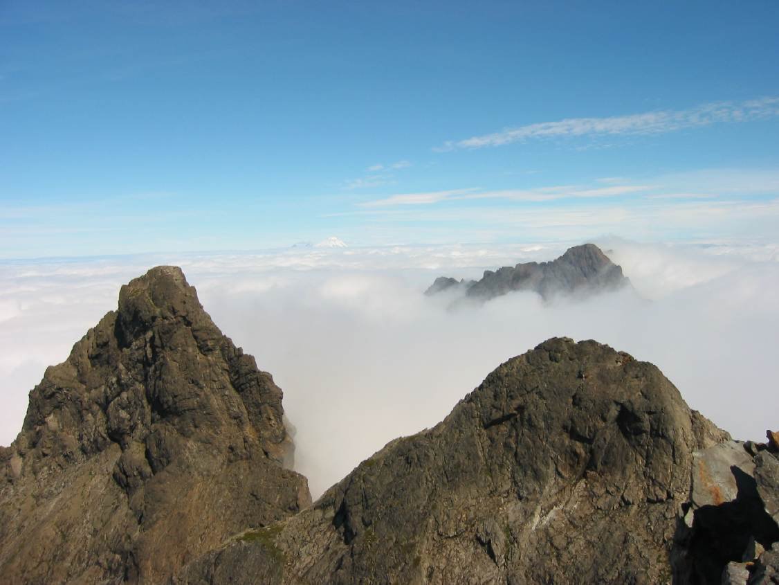 Summit Peaks Above Clouds