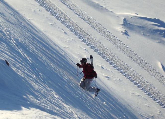 hauling-ass up some wind-packed powder