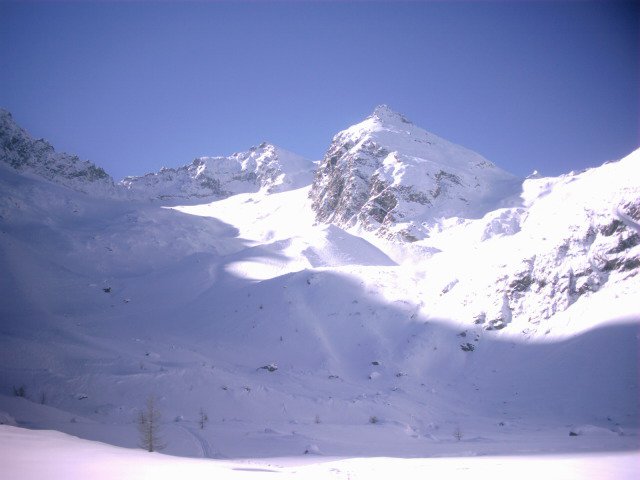 ...after skiing first tracks from that peak in the background