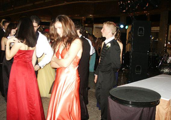 that's me and my hungairan tux; oh, and hilary in her orange dress and stripper shoes