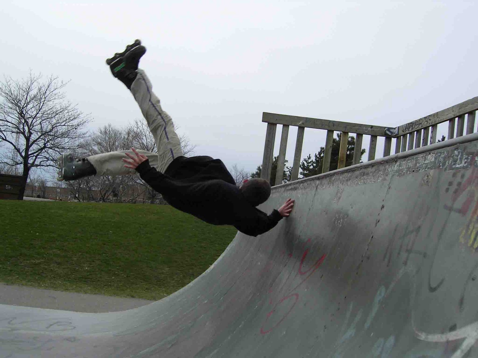 rollerblade in the half-pipe