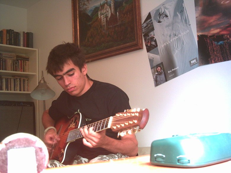 lookin' like a mess while playin' the guitar