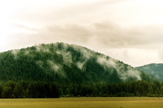 Mountain w/ mist coming off