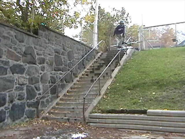 small jump with skier on the rail