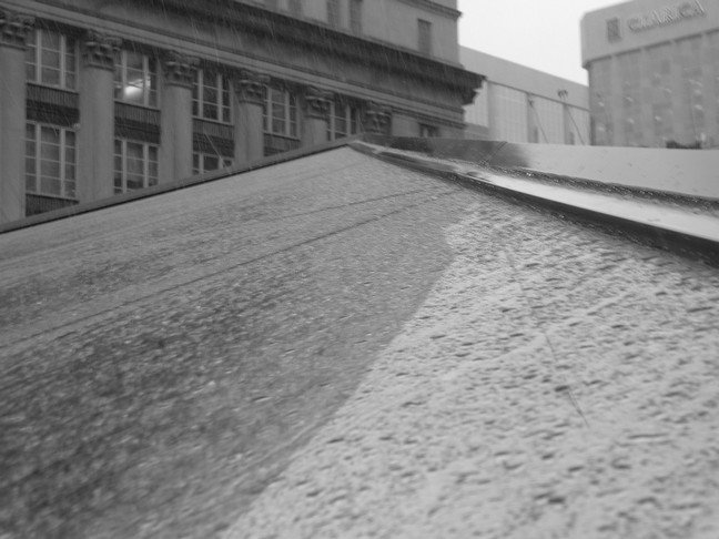 Rain falling on a pyramid window