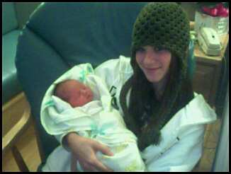 Me and my newborn baby cousin Tavi