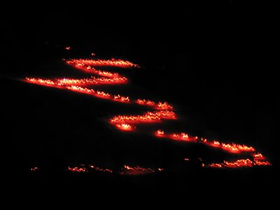 The Christmas Eve torchlight parade as seen from the base of the mountain.