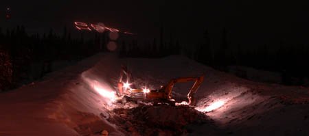 This is a picture of a huge superpipe , but its not finished yet . Its about 500feet long and 6metre