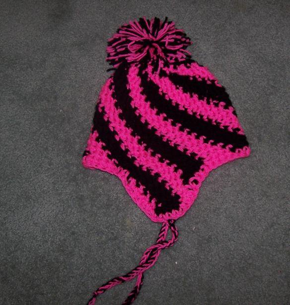 black and pink spiral hat