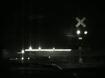 train crossing at night