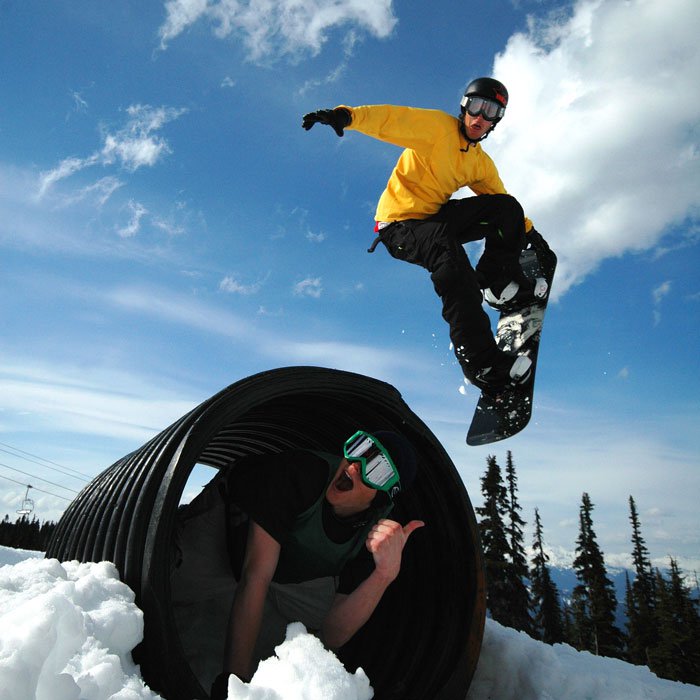 Fun snowboard shot on barrel jib