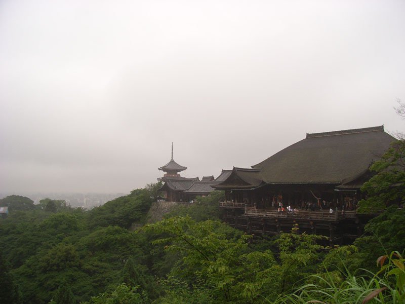 Temple with Kyoto city in the haze...