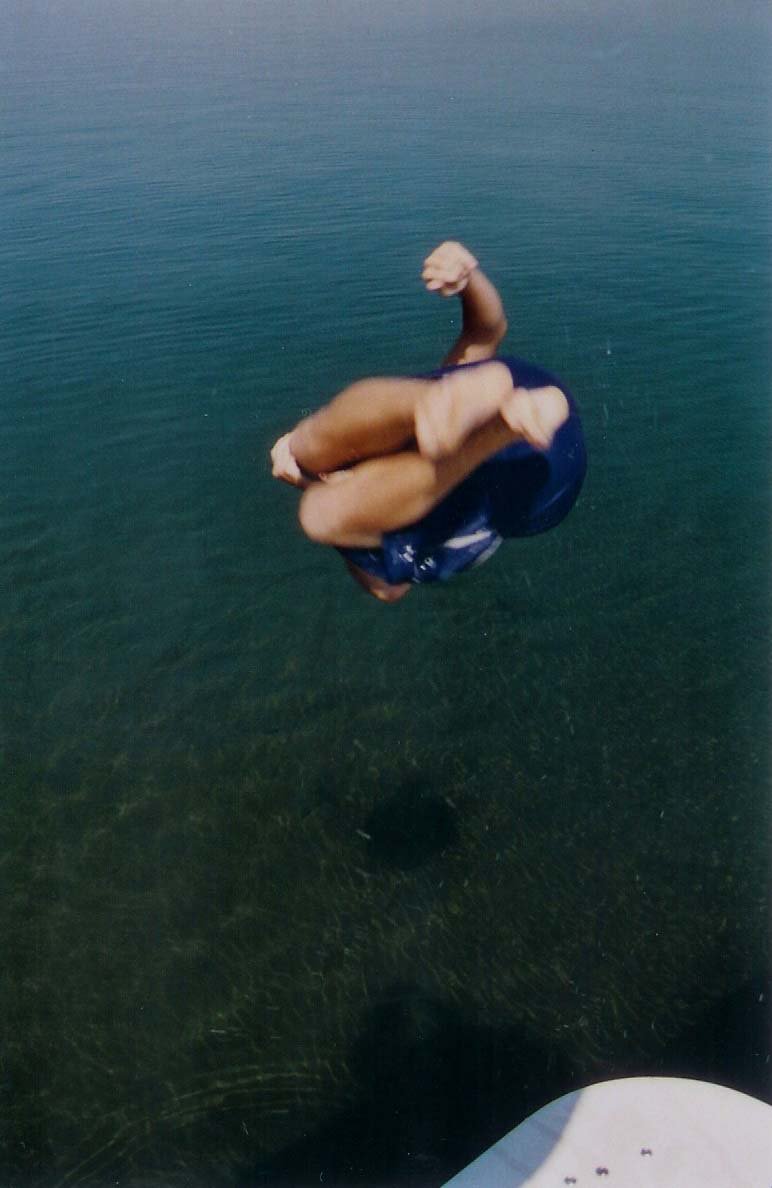 My Bro jumping off of our boat