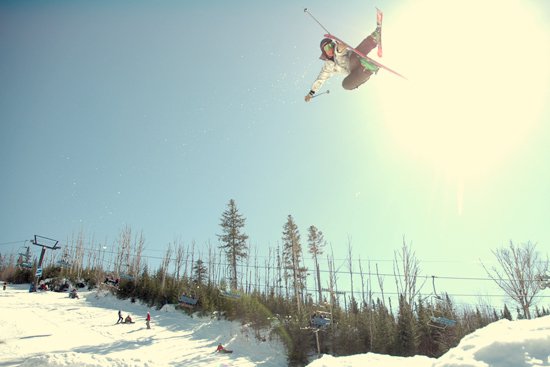 Lucas Gonthier, pushing a reverse nose grab to the limit.