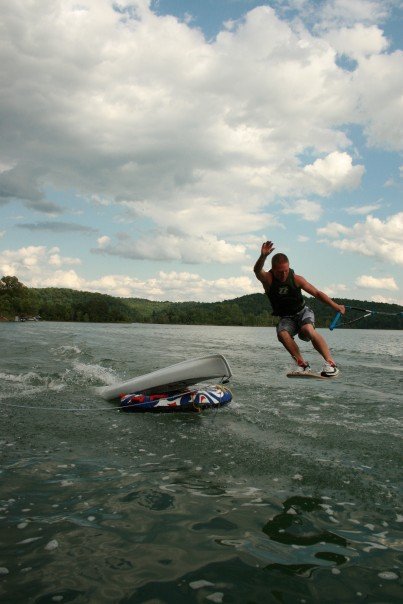 Wakeskating stunt.