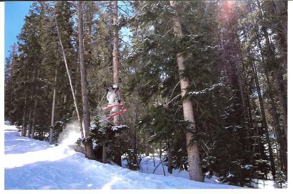 Shane jumps through some trees