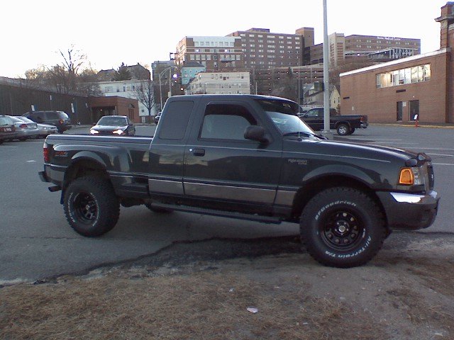 My ranger with new tires and black steels