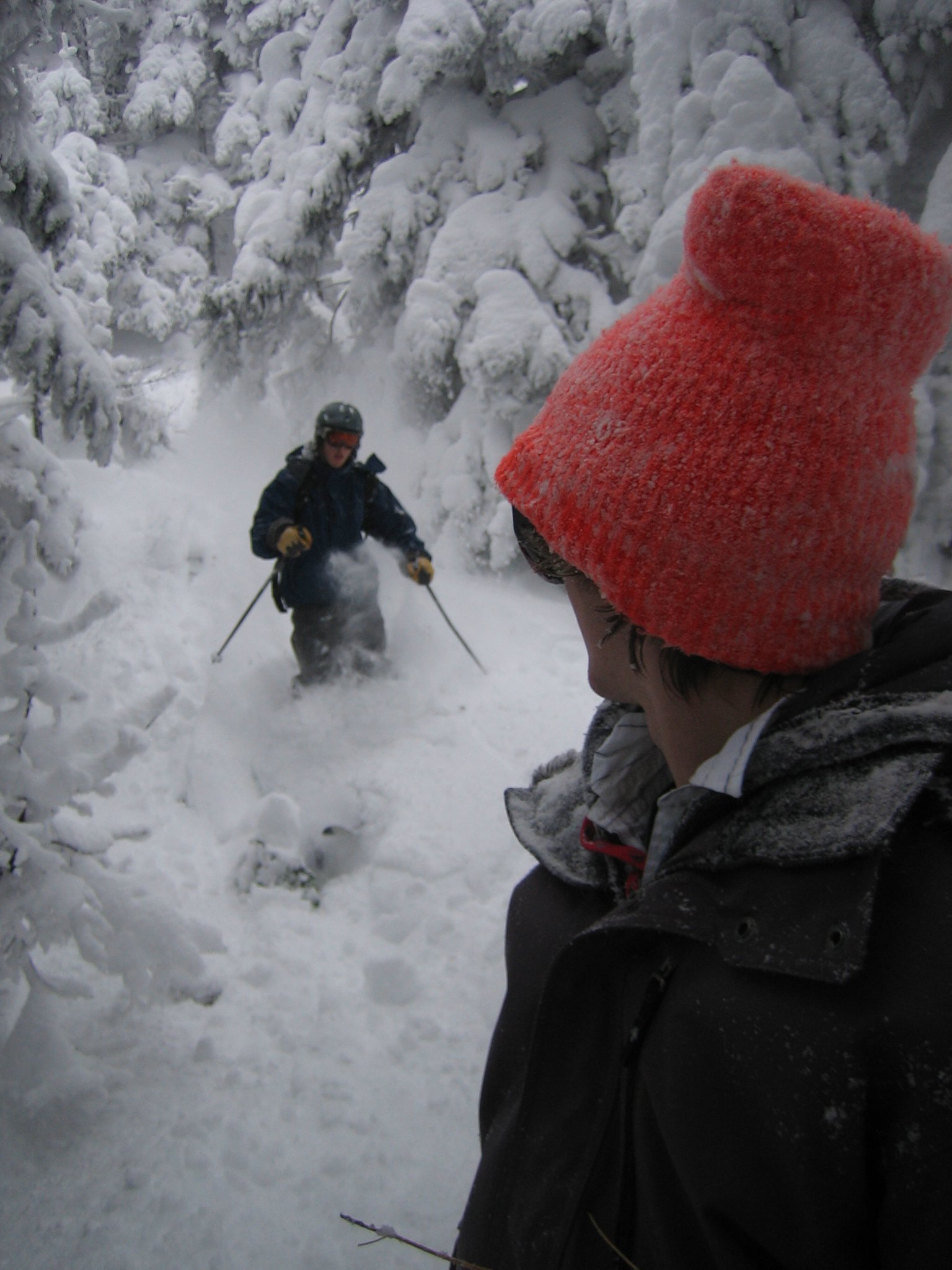 Skiing and an orange hat