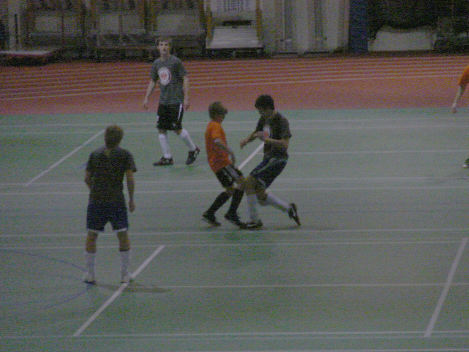 Playing indoor soccer