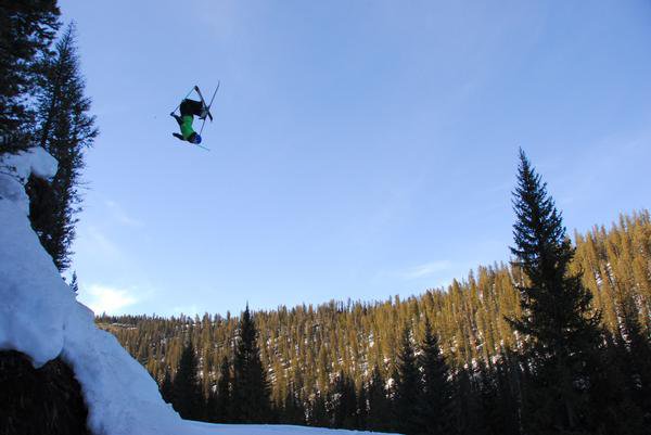 HUGE backflip over 70 foot road gap