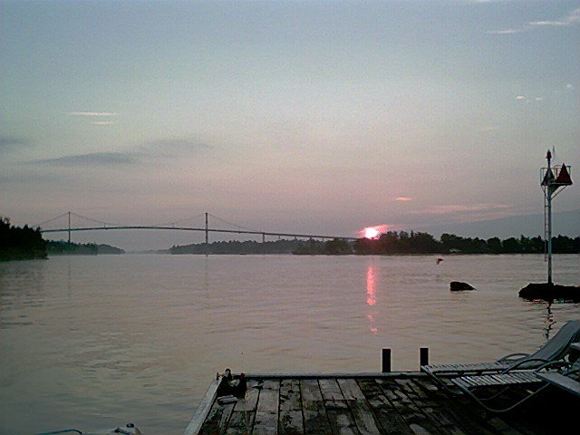 Sunrise on the dock, heron over the riv