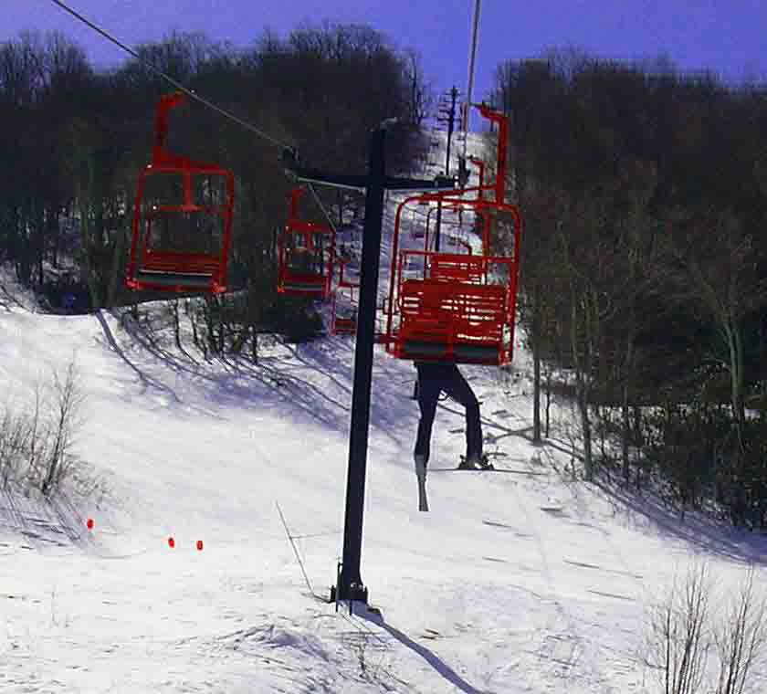 Ski patroller almost fell off the lift