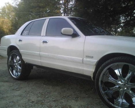 My new crown vic with 26's