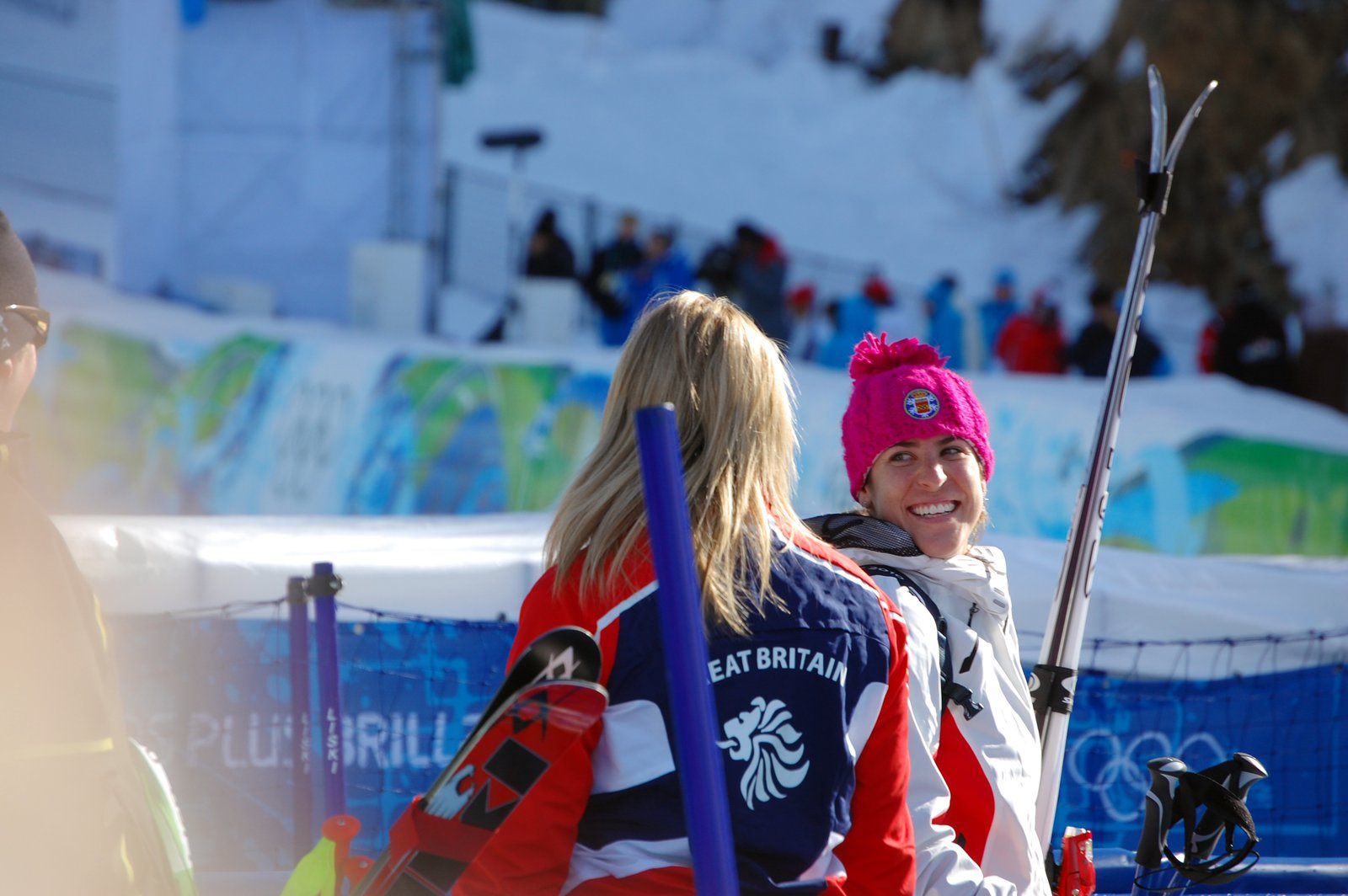 Women's downhill british skier congratulating fellow racer