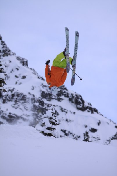 James trying to scratch the back of his neck with his skis