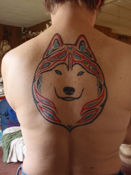 Smiley's dog tat