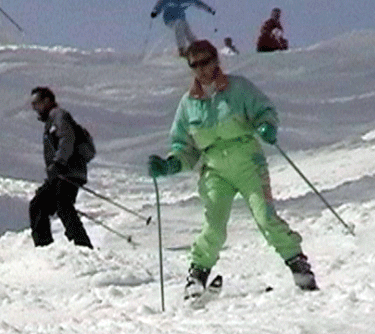 Mom and Dad skiing