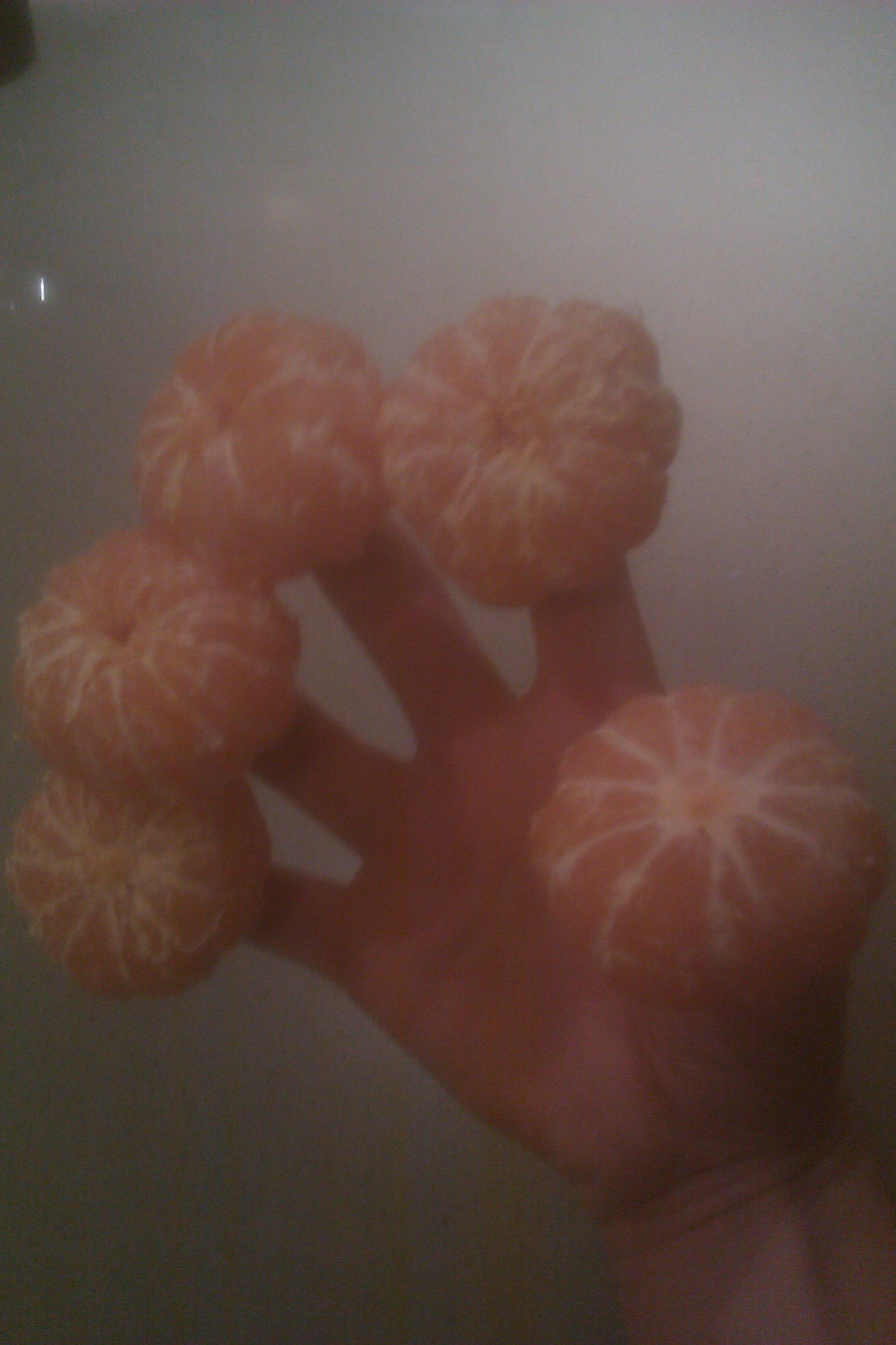 Tangerine hand