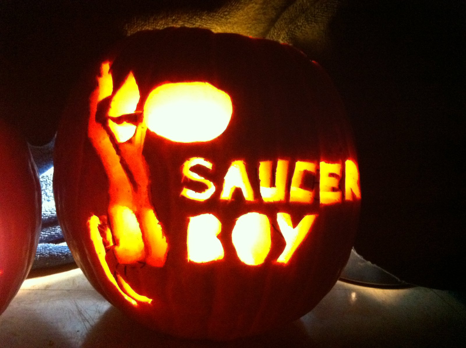 saucer boy carving