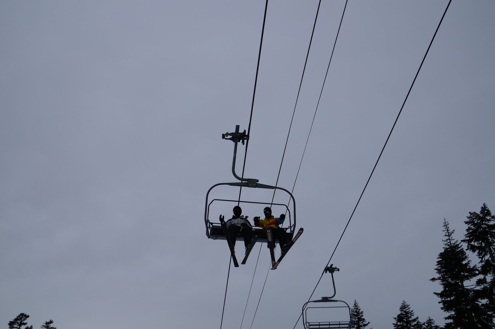 Alex Grover riding up the chairlift